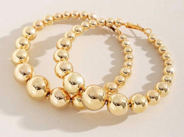 Graduated pearl hoops