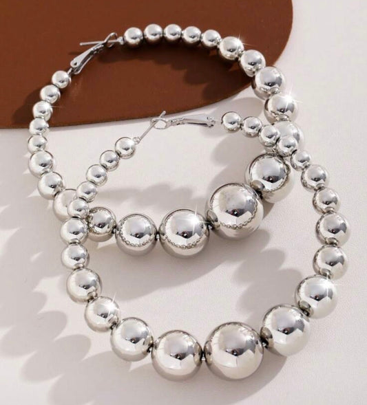 Graduated pearl hoops